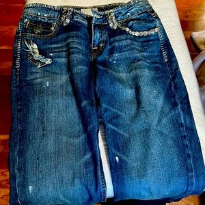 Tavernati boot cut jeans. Metal rivets on top and belt loops. Boot cut size 29